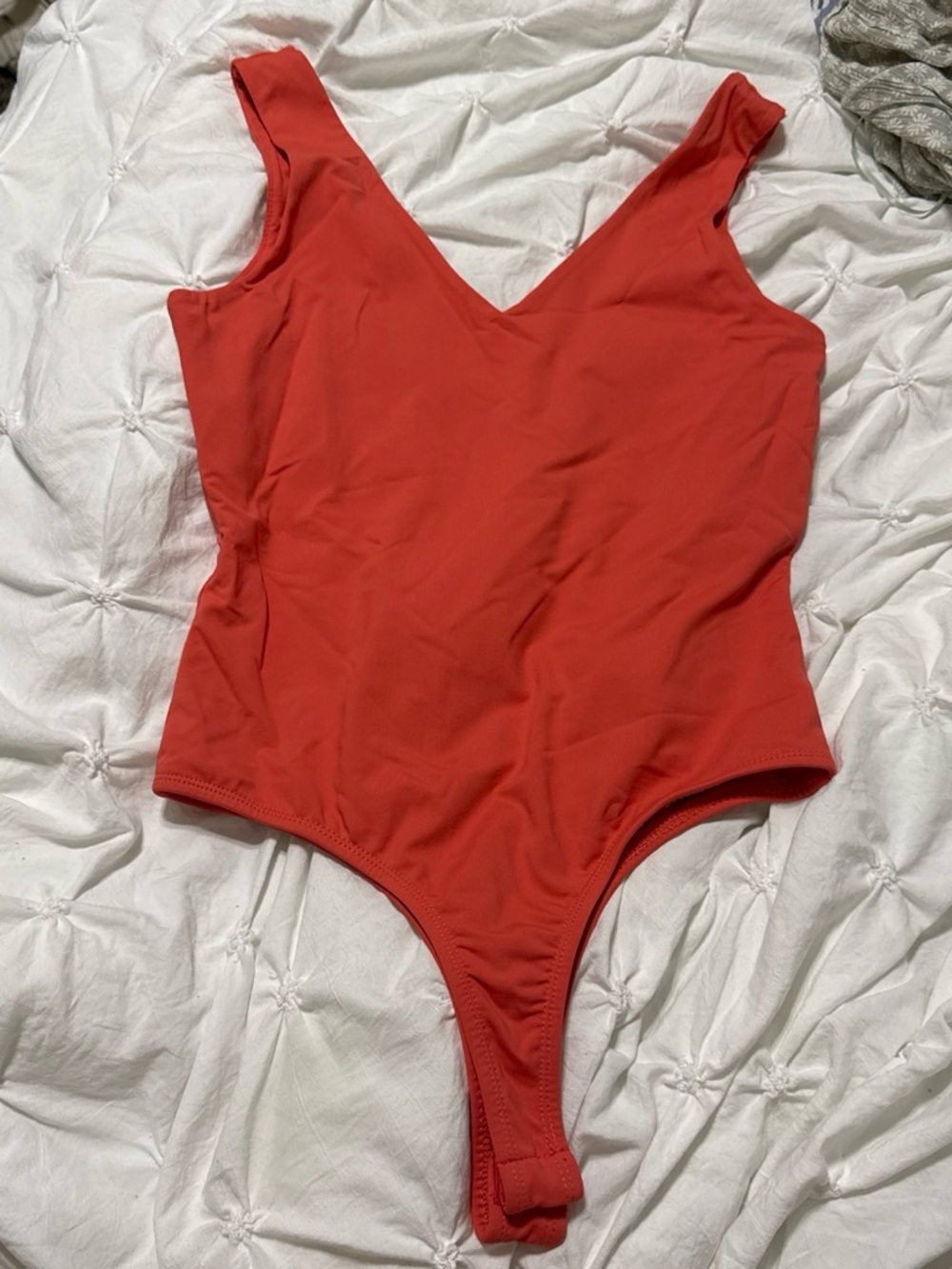 Coral V-Neck Women's Bodysuit - Sleek Everyday Layering